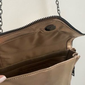 Rose gold / smoke metal Banana Republic vegan leather cross body.